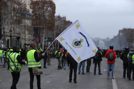  PARIS, FRANCE - DECEMBER 08:Gilets jaune demonstrators clash with police on the Champs Elysees near the Arc de Triomphe on December 8, 2018 in Paris France. ''Yellow Vests' ('Gilet Jaunes' or 'Vestes Jaunes') is a protest movement without political affiliation which was inspired by opposition to a new fuel tax. After a month of protests, which have wrecked parts of Paris and other French cities, there are fears the movement has been infiltrated by 'ultra-violent' protesters. Today's protest has involved at least 8,000 demonstrators gathering in the Parisian city centre with police having made over 1150 arrests.   (Photo by Patrick Aventurier/Gamma)