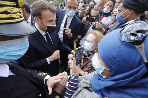 French President Emmanuel Macron meet people in La Mosson neighborhood during his visit in Montpellier, France on April 19, 2021.Macron and his Minister of Interior, Gerald Darmanin, make a one day visit to Montpellier on the theme of security and policing.Photo by Patrick Aventurier/Abacapress