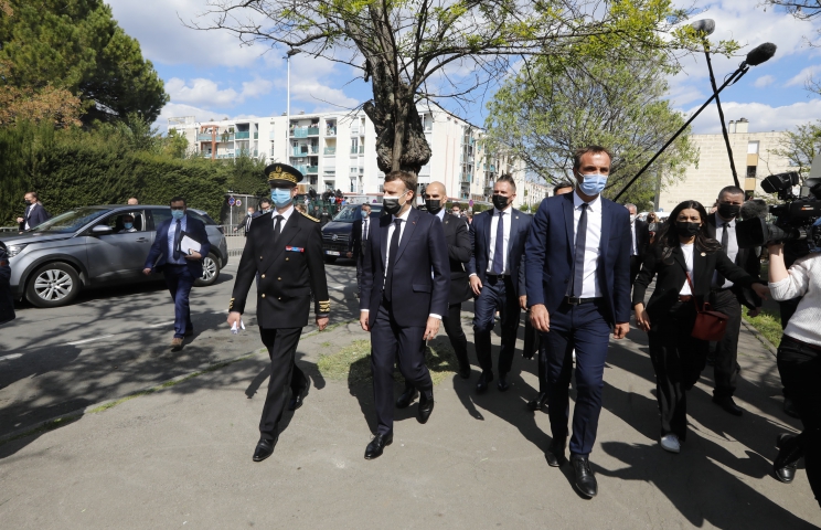  French President Emmanuel Macron meet in La Mosson neighborhood during his visit in Montpellier, France on April 19, 2021.Macron and his Minister of Interior, Gerald Darmanin, make a one day visit to Montpellier on the theme of security and policing.Photo by Patrick Aventurier/Abacapress