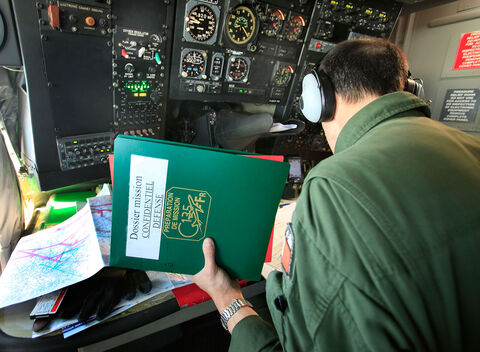  ISTRES, FRANCE - APRIL 09:  French air force crew with the "Confidentiel defence documents"in airbone  C.135 refuelling tanker aicraft during the mission over Libya.French air operation "Harmattan", the non-fly zone in the critical region on Benghazi  continue in accordance with the United Nations.on April 9, 2011 in Istres, France.  (Photo by Patrick Aventurier/Getty Images)