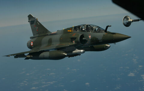  ISTRES, FRANCE - APRIL 09:  French Mirage 2000 figther jet refuels with a Boing C.135 refuelling tanker over Mediterranean sea during the air operation "Harmattan", the non-fly zone operations in the critical region on Benghazi in accordance with the United Nations.on April 9, 2011 in Istres, France.  (Photo by Patrick Aventurier/Getty Images)