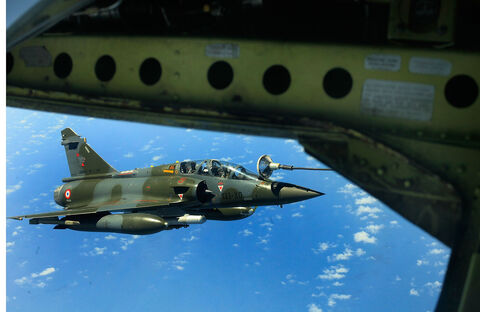  ISTRES, FRANCE - APRIL 09:  French Mirage 2000 figther jet refuels with a Boing C.135 refuelling tanker over Mediterranean sea during the air operation "Harmattan", the non-fly zone operations in the critical region on Benghazi in accordance with the United Nations.on April 9, 2011 in Istres, France.  (Photo by Patrick Aventurier/Getty Images)