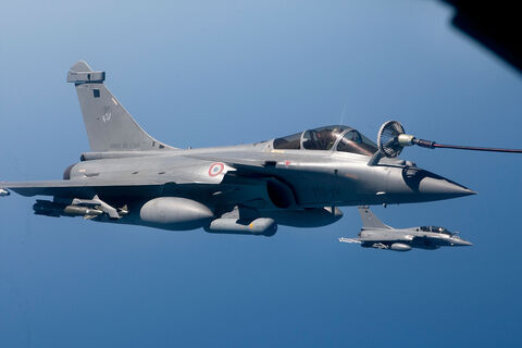  ISTRES, FRANCE - APRIL 09:  French air force Rafale figther jet refuels with an Boing C.135 refuelling tanker aircraft over Mediterranean sea during the air operation "Harmattan", the non-fly zone operations in the critical region on Benghazi in accordance with the United Nations.on April 9, 2011 in Istres, France.  (Photo by SIRPA/Patrick Aventurier/Getty Images)