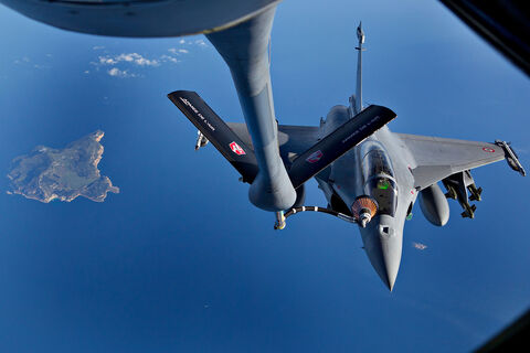  ISTRES, FRANCE - APRIL 09:  French air force Rafale figther jet refuels with an Boing C.135 refuelling tanker aircraft over Mediterranean sea during the air operation "Harmattan", the non-fly zone operations in the critical region on Benghazi in accordance with the United Nations.on April 9, 2011 in Istres, France.  (Photo by Patrick Aventurier/Getty Images)