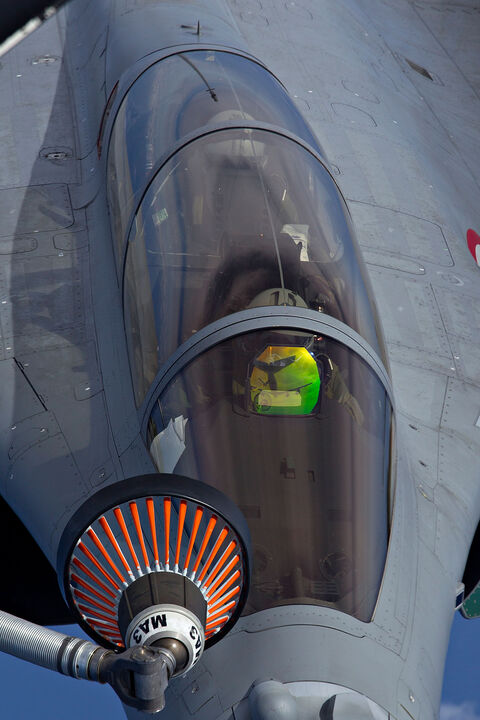  ISTRES, FRANCE - APRIL 09:  French air force Rafale figther jet refuels with an Boing C.135 refuelling tanker aircraft over Mediterranean sea during the air operation "Harmattan", the non-fly zone operations in the critical region on Benghazi in accordance with the United Nations.on April 9, 2011 in Istres, France.  (Photo by SIRPA/ Patrick Aventurier/Getty Images)