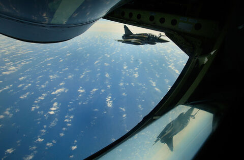  ISTRES, FRANCE - APRIL 09:  French air force Mirage F-1 figther jet refuels with an Boing C.135 refuelling tanker aircraft over Mediterranean sea during the air operation "Harmattan", the non-fly zone operations in the critical region on Benghazi in accordance with the United Nations.on April 9, 2011 in Istres, France.  (Photo by Patrick Aventurier/Getty Images)