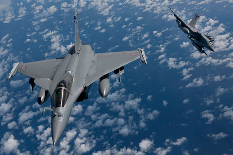  ISTRES, FRANCE - APRIL 09:  French air force Rafale figthers jet over Mediterranean sea during the air operation "Harmattan", the non-fly zone operations in the critical region on Benghazi in accordance with the United Nations.on April 9, 2011 in Istres, France.  (Photo by SIRPA/Patrick Aventurier/Getty Images)